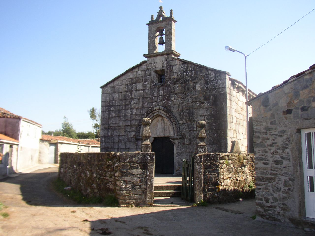 The Church Of Santa María De Leboreiro With The Virgin Carved In The Tympanum