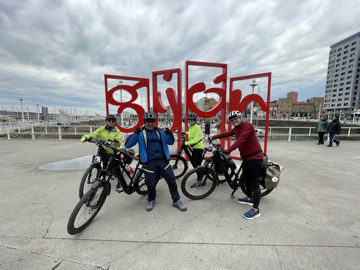 Group Of Cyclists With Tournride E-Bikes In Gijón During The Camino Del Norte